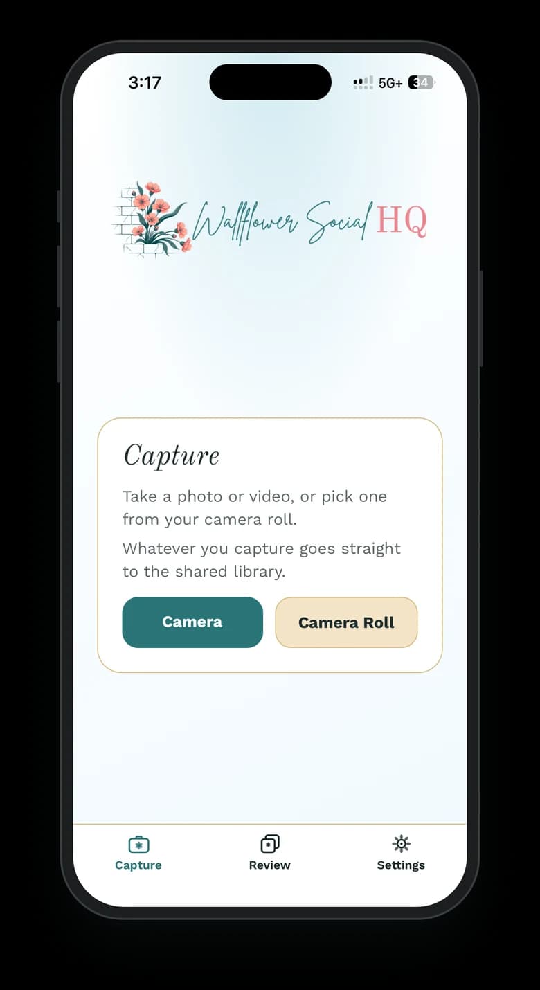 The Wallflower phone app on an iPhone, open to the Capture tab: “Take a photo or video, or pick one from your camera roll. Whatever you capture goes straight to the shared library,” with Camera and Camera Roll buttons.
